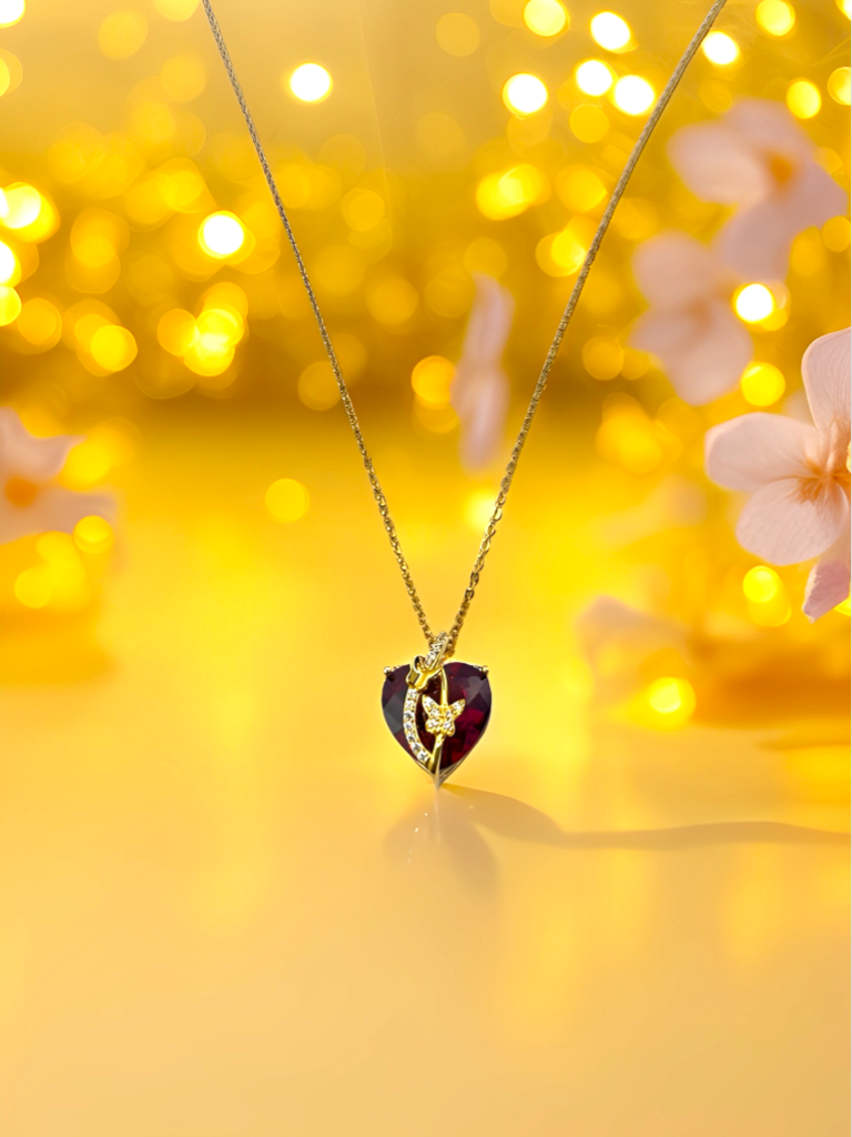 Heart necklace with butterfly.