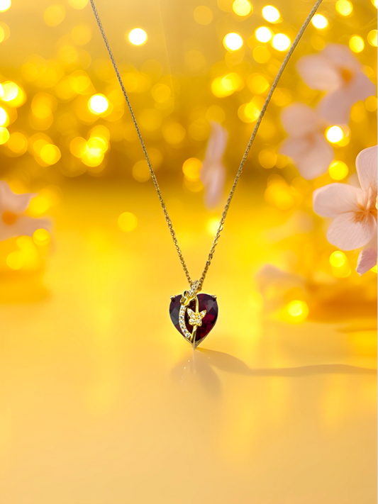 Heart necklace with butterfly.